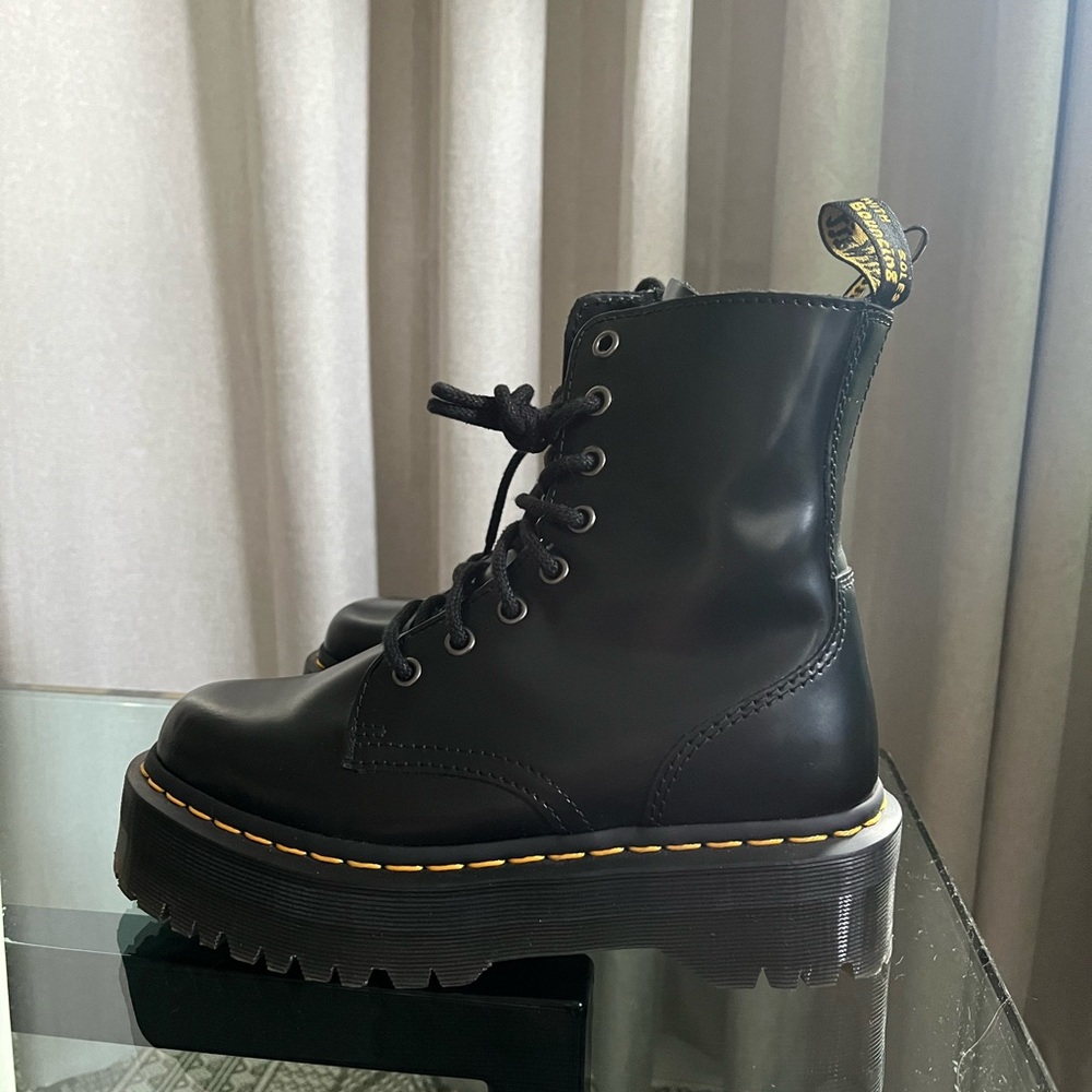Dr. Martens Black Combat Boots with Chunky Sole and Lace-Up Design